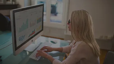 Woman working at a computer