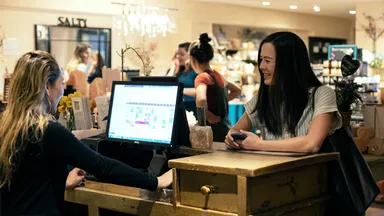two women at checkout in a spa salon 