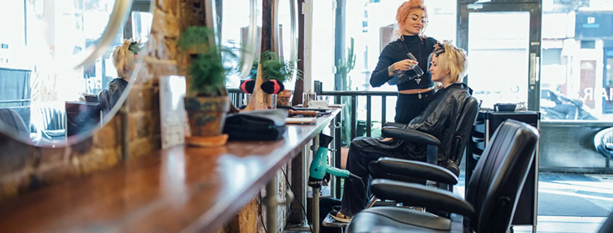 Woman getting her hair cut