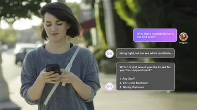 Woman using mobile phone with chat box visible