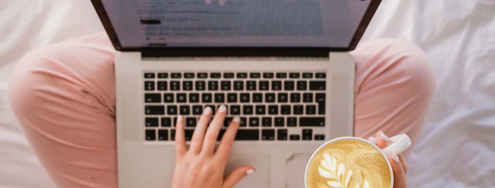 woman on laptop with latte