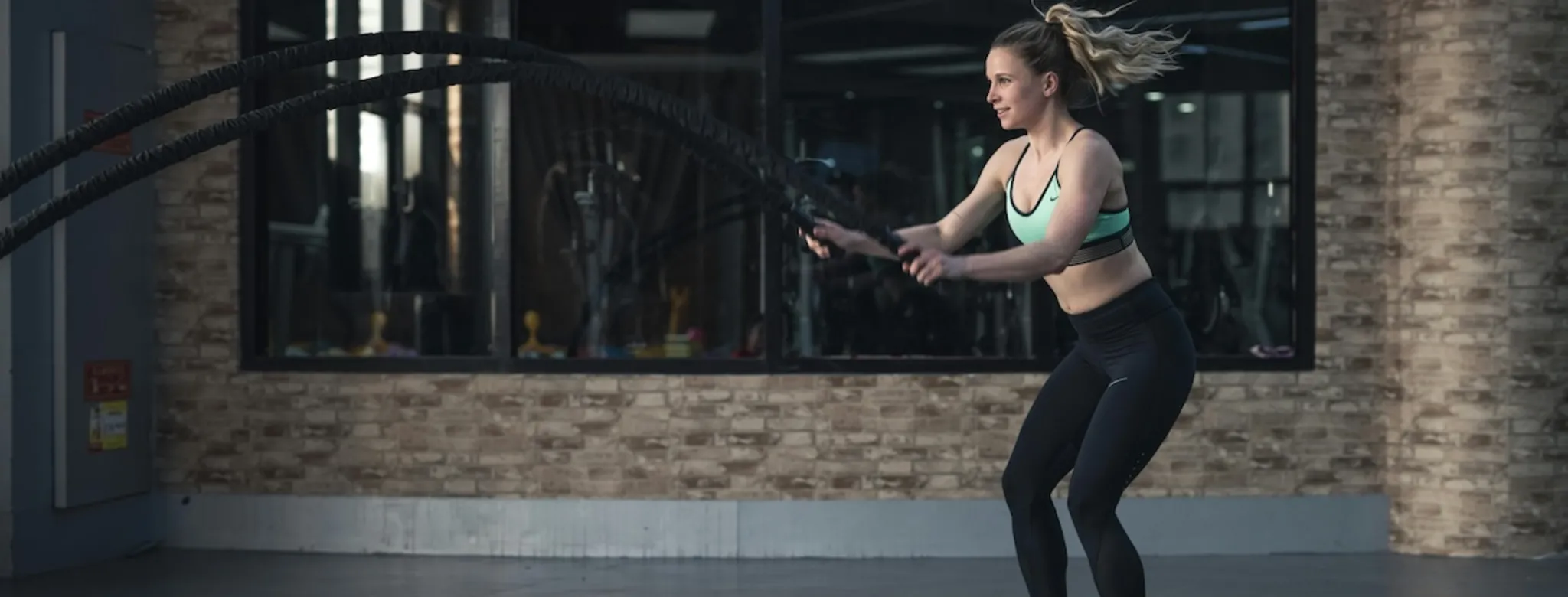 A woman working out in the gym.